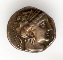 Dracma d'Empúries, amb la llegenda grega EMPORITON, plata, la Barroca, Sant Climent d'Amer (Amer, La Selva), segle III aC