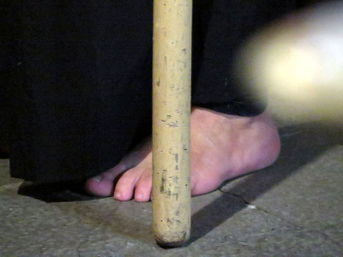 Penitent a la processó del Sant Enterrament