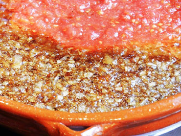 Conill amb olives: la tomata