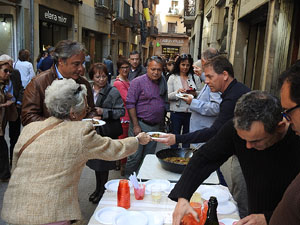 Presentació 'Un any a la cuina' d'Enric Herce a la Llibreria Geli de Girona, amb Salvador Garcia-Arbós i una cassola d'Abraham Simon