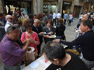 Presentació 'Un any a la cuina' d'Enric Herce a la Llibreria Geli de Girona, amb Salvador Garcia-Arbós i una cassola d'Abraham Simon